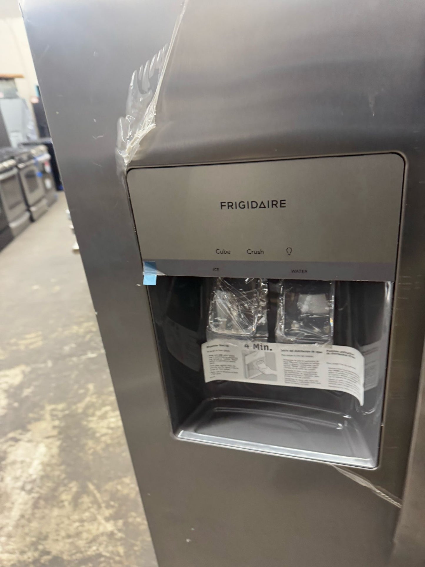 Frigidaire 25.6-cu ft Side-by-Side Refrigerator with Ice Maker, Water and Ice Dispenser (Stainless Steel)New Scratch and dent
