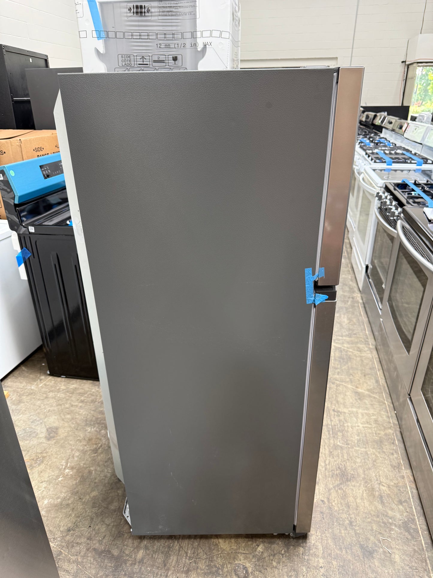 Frigidaire FFHT1425VV07 13.9 Cu. Ft. Stainless Steel Look Top-Freezer Refrigerator