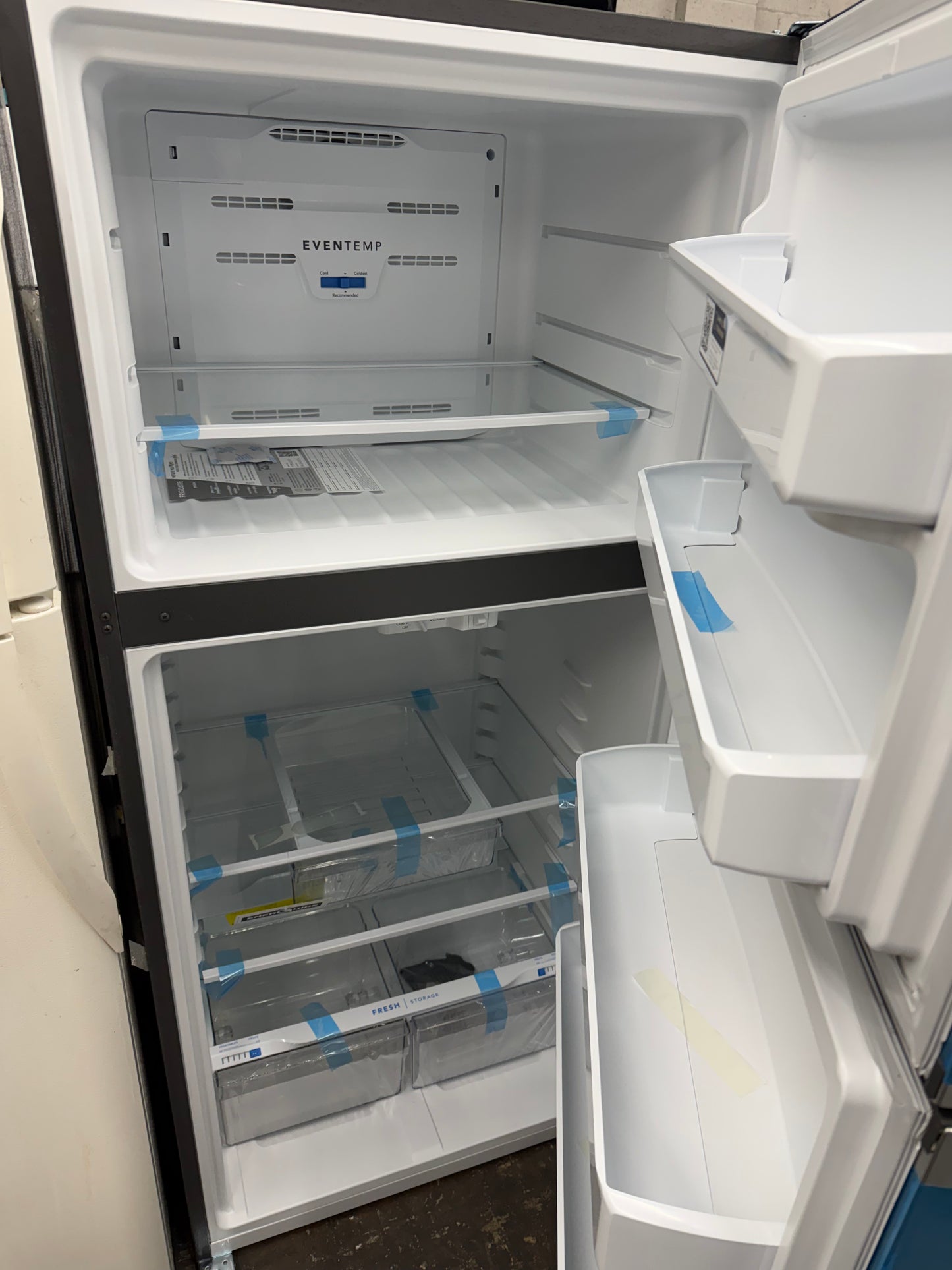 Frigidaire top frezzer bottom refrigerator new 30”