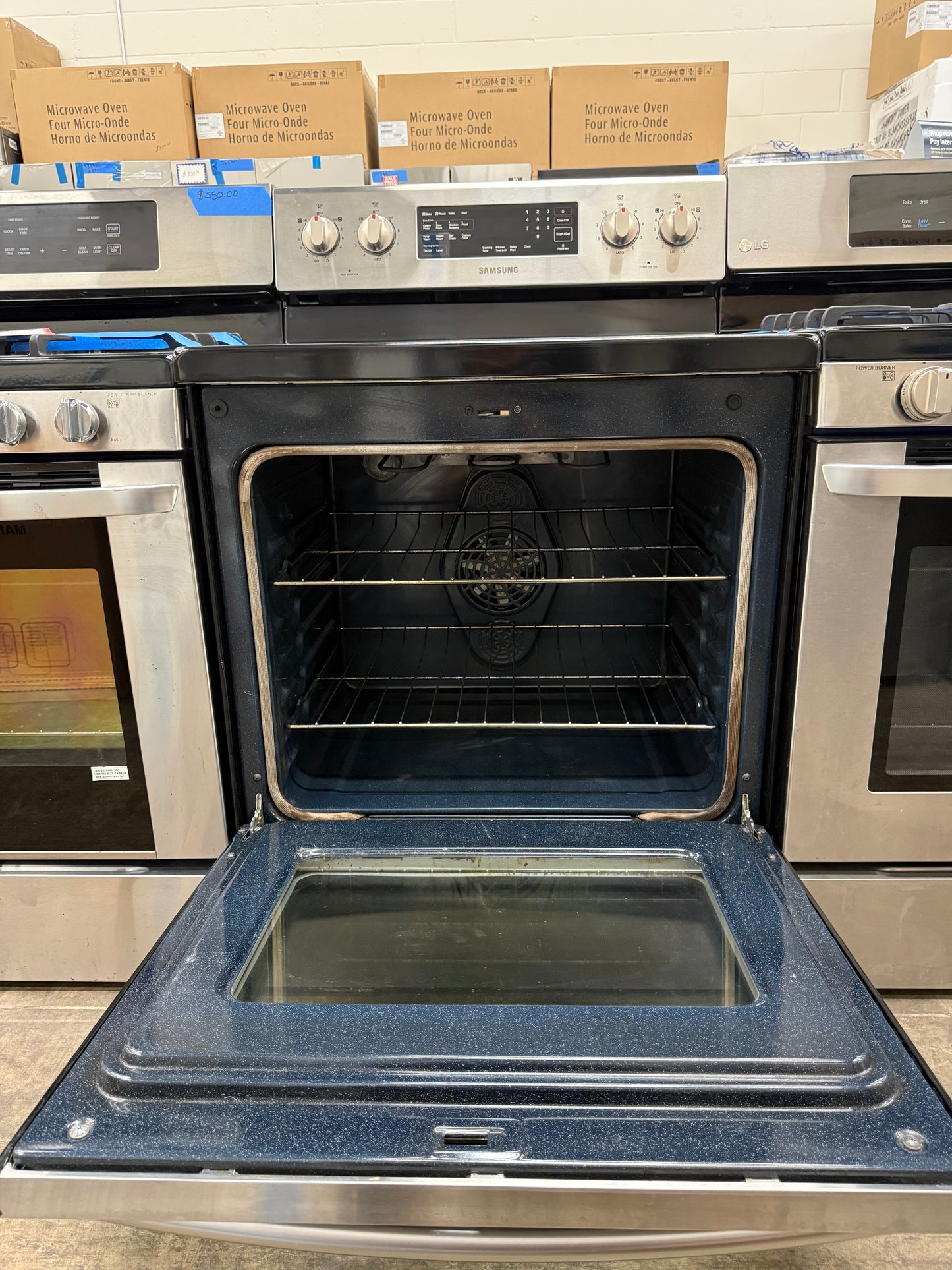 Samsung NE595R0ABSR 30” Freestanding Electric Convection Range – Stainless Steel